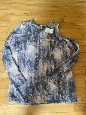 143 story great top. One open shoulder. Front cut out. Size large. NWT